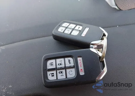 2024 Honda Odyssey Touring from USA, damaged, VIN 5FNRL6H82RB031695